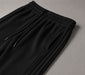 Pleated Wide-Leg Interlock Trousers Black