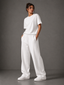 Pleated Wide-Leg Interlock Trousers - White